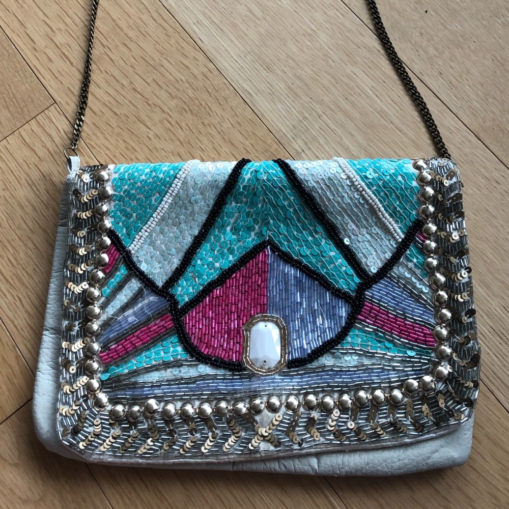 kimichi blue sequined cross body bag.